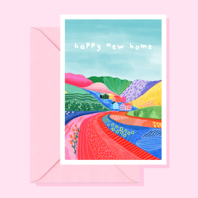 Cartão de felicitações com ilustração de colinas coloridas e casas e texto happy new home