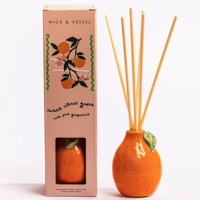 Difusor de fragrância Sweet Citrus Grove com embalagem e garrafa cerâmica laranja