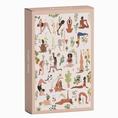 Caixa de jogo de quebra-cabeças com ilustrações coloridas de posições de yoga e plantas