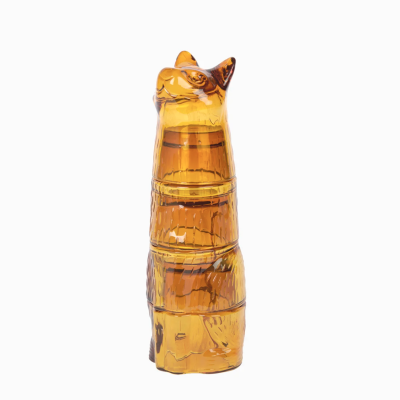 Objeto decorativo em cerâmica âmbar na forma de gato
