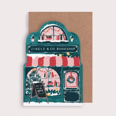 Cartão ilustrado de livraria com placa JINGLE & CO. BOOKSHOP e placa de chão WE ARE OPEN