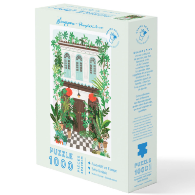 Caixa de puzzle 1000 peças com imagem de casa branca com plantas e texto em francês