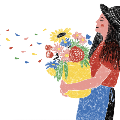 Mulher com chapéu a segurar vaso com flores coloridas e pétalas no ar