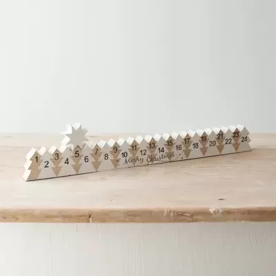 Calendário do advento em madeira clara com números e estrela branca