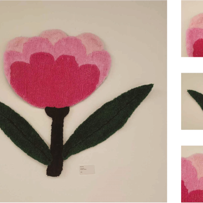 Tapete ou decoração em formato de flor rosa com caule castanho e folhas verdes