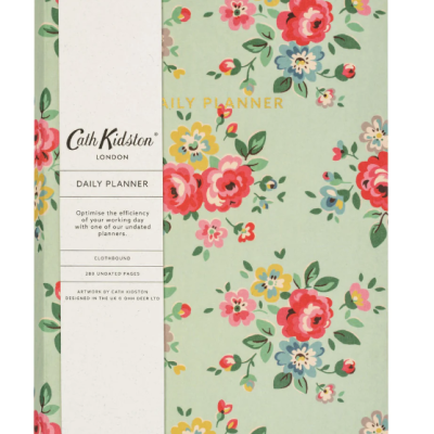 Capa de diário diário com padrão floral colorido e faixa branca com texto Cath Kidston Daily Planner