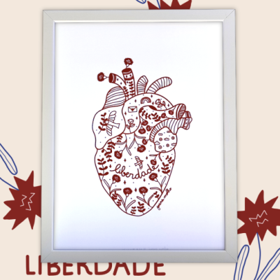 Ilustração vermelha de coração anatómico com palavra LIBERDADE em quadro