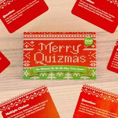 Caixa do jogo Merry Quizmas com cartas de perguntas vermelhas