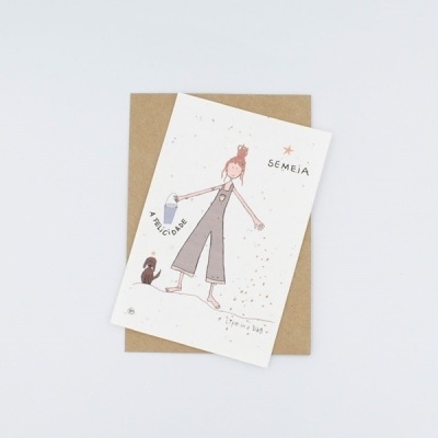 Cartão ilustrado com figura feminina e texto sobre envelope castanho