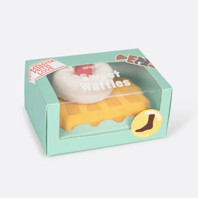 Caixa verde com meias com padrão de waffle dentro