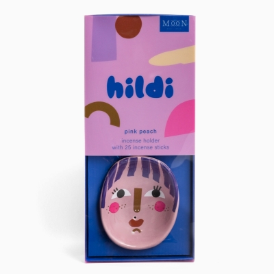 Suporte para incenso rosa com design de rosto em embalagem colorida