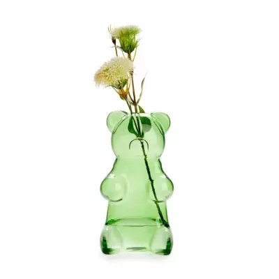 Vaso verde em forma de urso com flores secas brancas