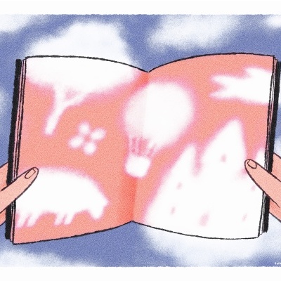 Livro aberto com ilustrações abstratas em rosa e branco, mãos segurando e céu azul ao fundo
