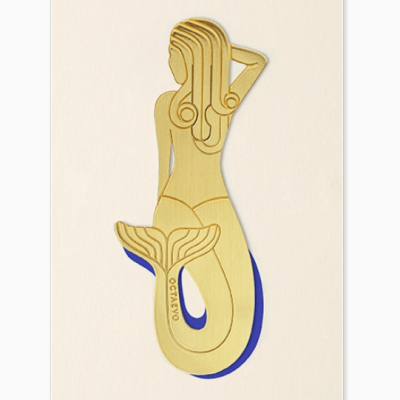 Marcador de livros sereia dourado em embalagem branca com texto OCTAEVO e SIRENA BOOKMARK