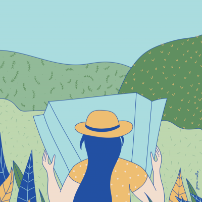 Pessoa com chapéu a ver um mapa em cenário natural com plantas e colinas