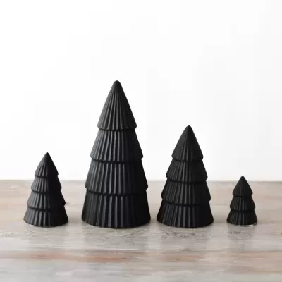 quatro árvores decorativas pretas com textura canelada