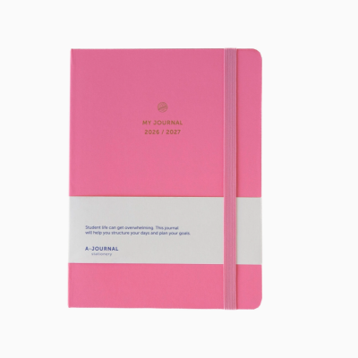 Caderno cor-de-rosa com texto dourado e faixa branca com texto