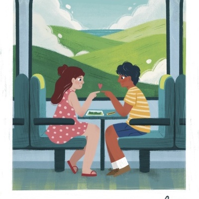 Casal jovem sentado em carruagem de comboio com colinas verdes ao fundo e texto Falling in love .23