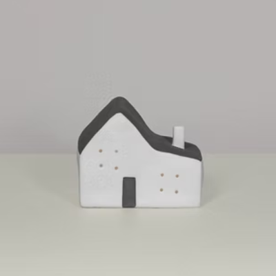 Miniatura de casa em cerâmica branca e preta