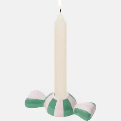 Castiçal às riscas verde e rosa com vela branca acesa