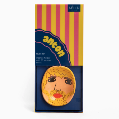 Caixa colorida de incenso com suporte ilustrado com rosto de barba amarela
