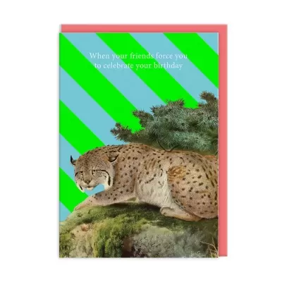 Cartão com lince sobre rocha e texto para aniversário