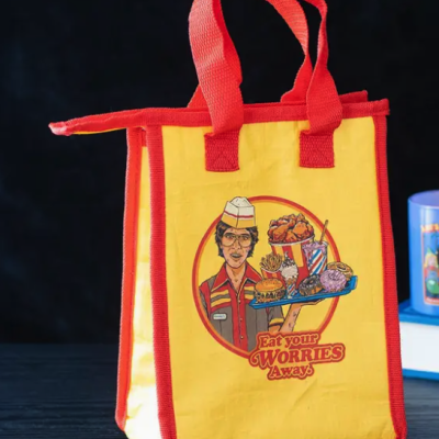 Saco térmico amarelo com ilustração e texto Eat your WORRIES Away.