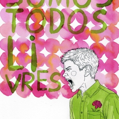 Pessoa com camisa verde e flor no bolso grita, texto SOMOS TODOS LIVRES em fundo cor-de-rosa.