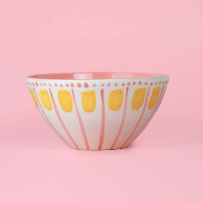 Taça de cerâmica decorativa cor-de-rosa e amarela