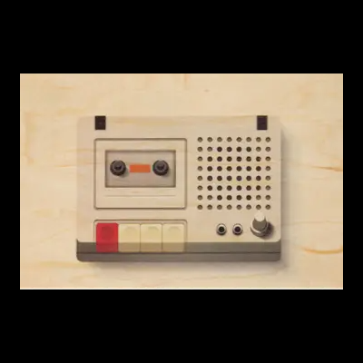 Gravador de fita cassete vintage bege com botões coloridos e alto-falante numa superfície de madeira