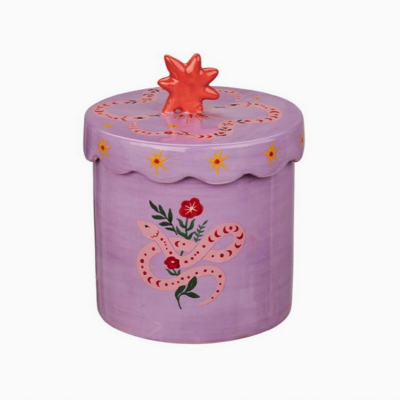 Caixa cilíndrica lilás com tampa e motivo de cobra e flores