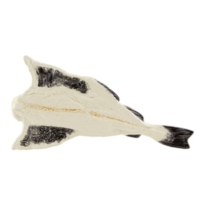 Aeroplano de peluche branco com manchas pretas e textura felpuda