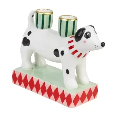Castiçal em cerâmica em forma de cão com manchas negras e base com padrão vermelho.