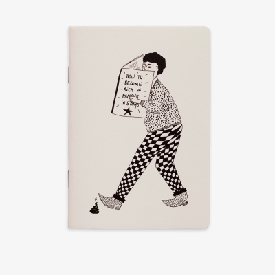 Caderno com desenho de pessoa a segurar cartaz com texto em inglês