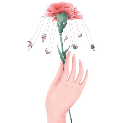 Mão segurando flor vermelha com baloiços e pessoas em miniatura