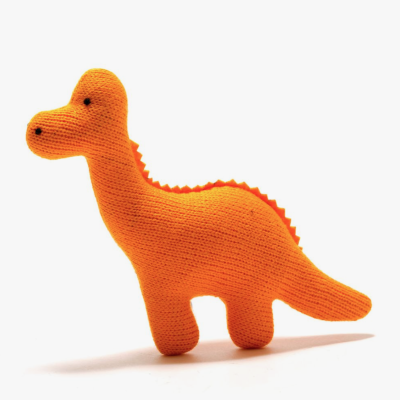 Brinquedo dinossauro de tecido tricotado laranja com olhos pretos