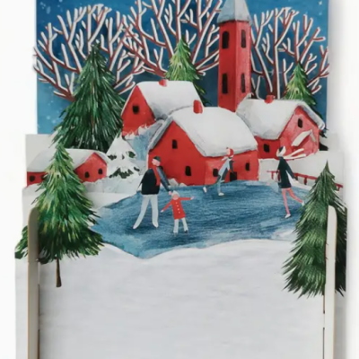 Modelo tridimensional de vila de inverno com casas vermelhas e figuras a patinar.
