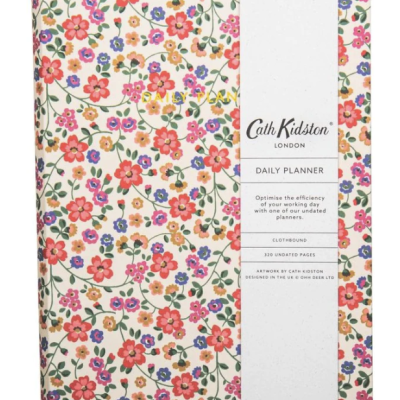 Planner diário Cath Kidston com padrão floral colorido e faixa branca com texto