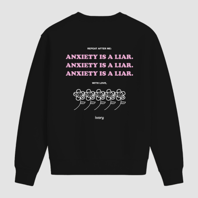 Sweatshirt preta com texto motivacional e desenho de flores sorridentes