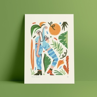 Ilustração colorida abstrata em papel apoiado contra parede verde