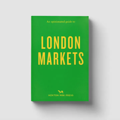 Livro verde com texto amarelo sobre mercados de Londres