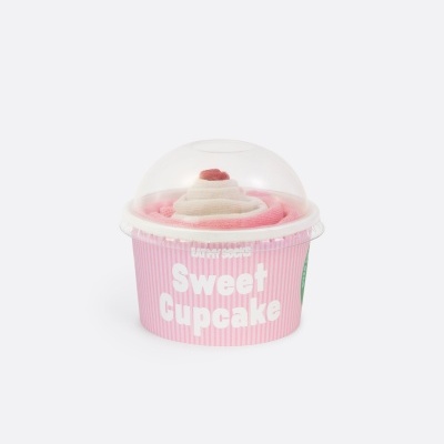 Cupcake falso rosa e branco numa embalagem com tampa transparente
