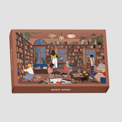 Caixa castanha com ilustração de biblioteca e a palavra BOOK NOOK.