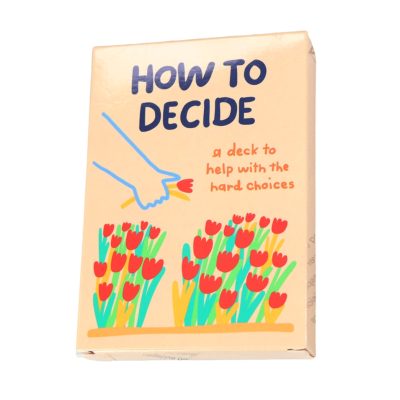 Caixa de cartas com ilustração de mão e flores e texto HOW TO DECIDE.