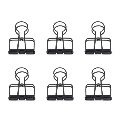 Seis pregadores de papel metálicos pretos em duas filas