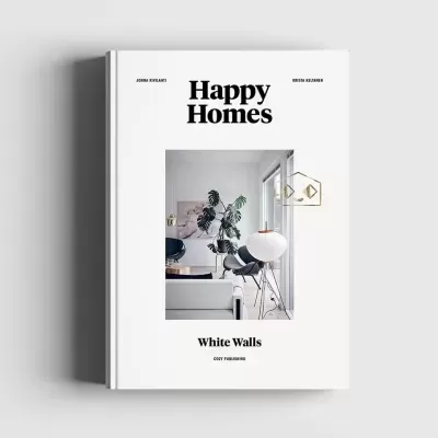 Capa de livro branca com título 'Happy Homes' e imagem de interior moderno.