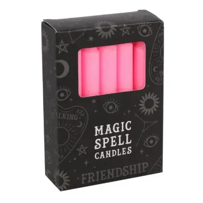 Caixa preta com velas cor de rosa e texto Magic Spell Candles Friendship