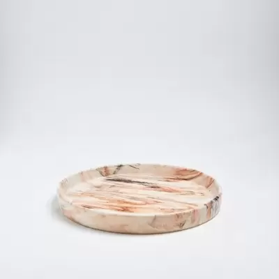Base redonda decorativa de mármore com padrão natural em tons bege e castanho