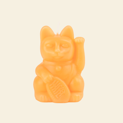 Vela laranja em forma de gato da sorte Maneki-neko