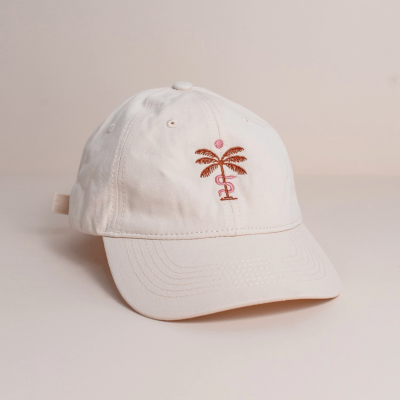 Boné bege claro com bordado de palmeira castanha e rosa